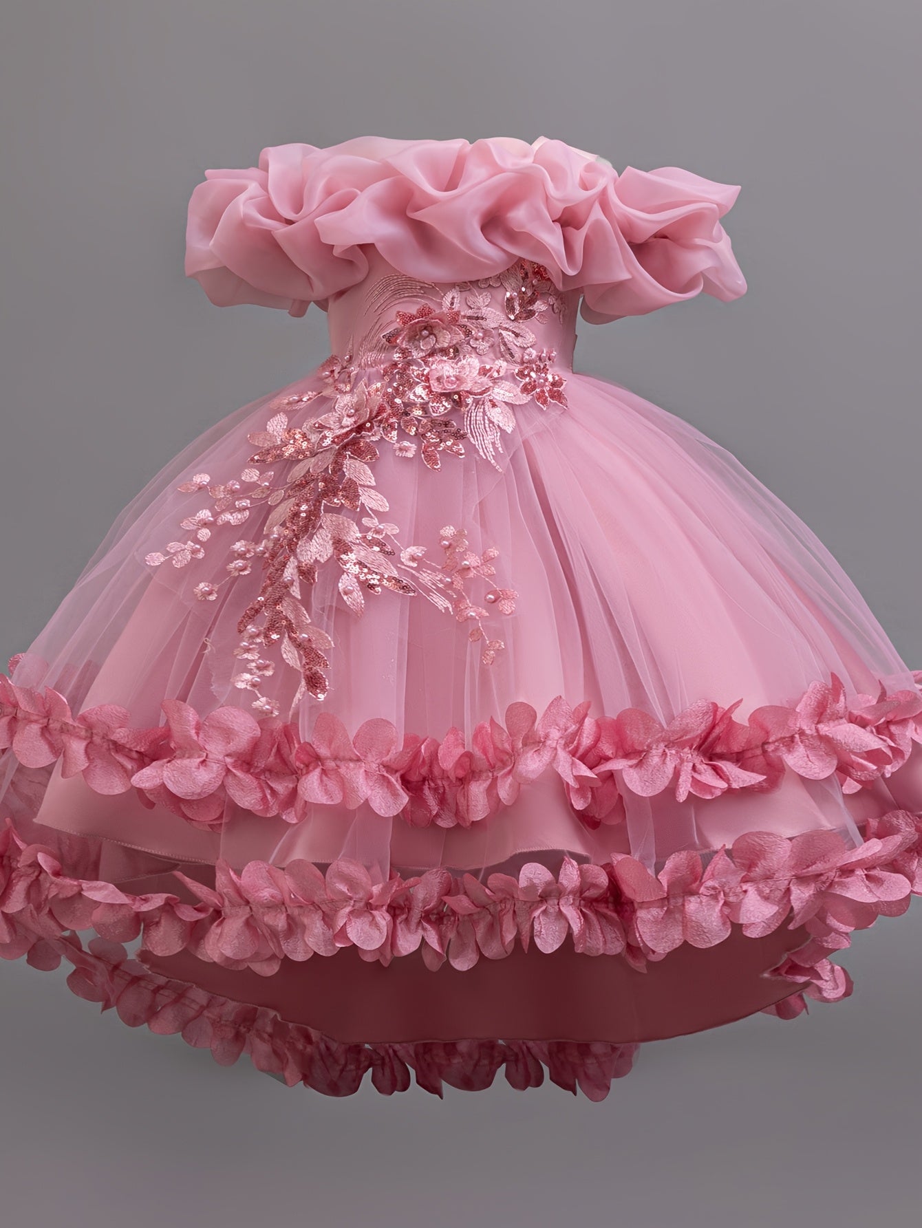 Sleeveless princess dress for girls with high-low hem, floral appliques, belt detail, and breathable polyester blend.