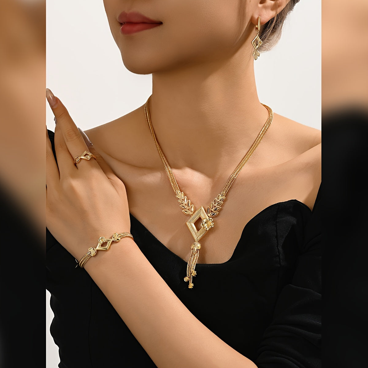 Vintage & Sexy Style 18K Golden Plated Copper Jewelry Set for Women, including Wedding Bridal Necklace, Bracelet, Ring, and Earrings. This all-season set is perfect for daily wear and gift giving.