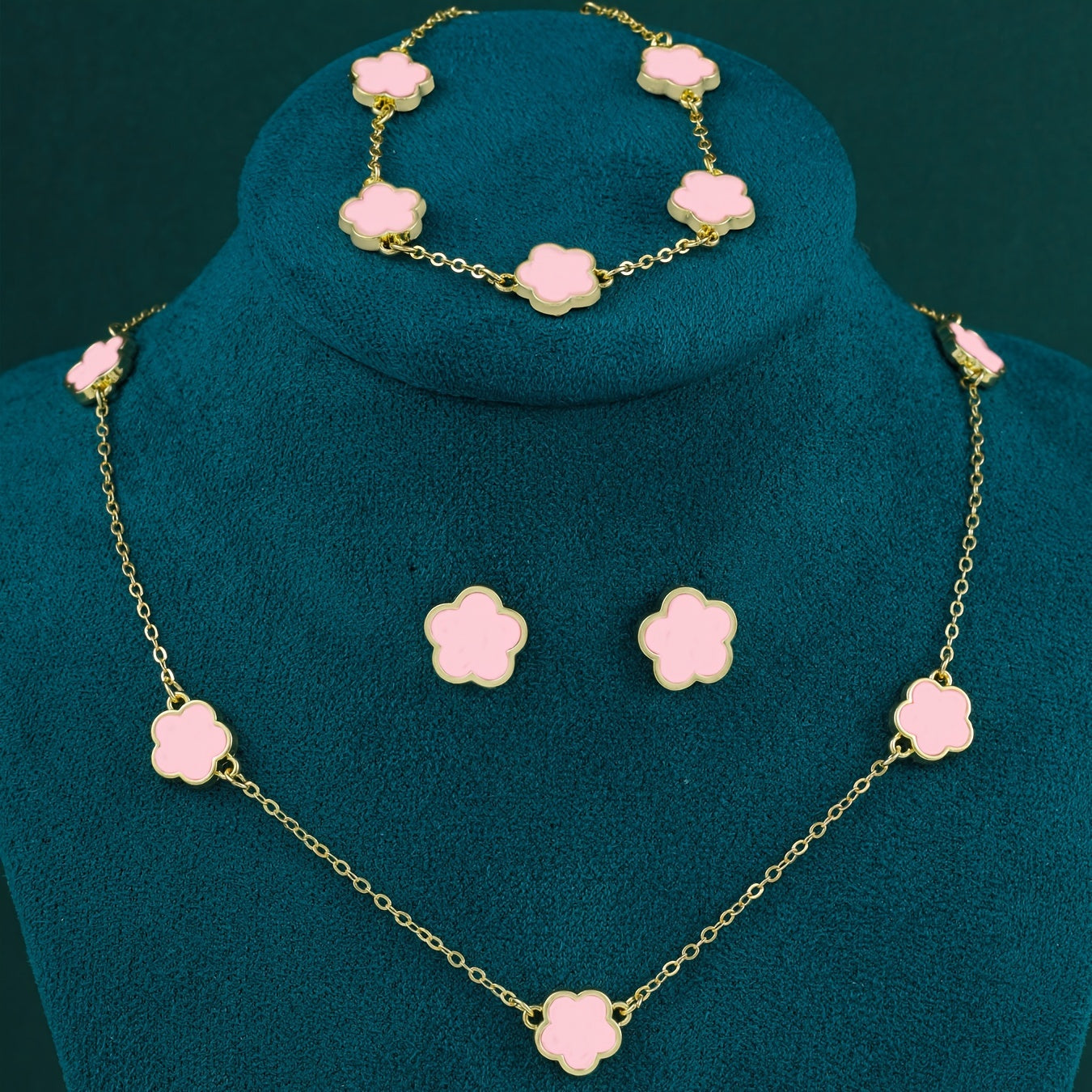 4-piece simple fashion copper jewelry set, including a necklace, earrings, and bracelet with a five-petal flower design, perfect for daily wear and gifting.