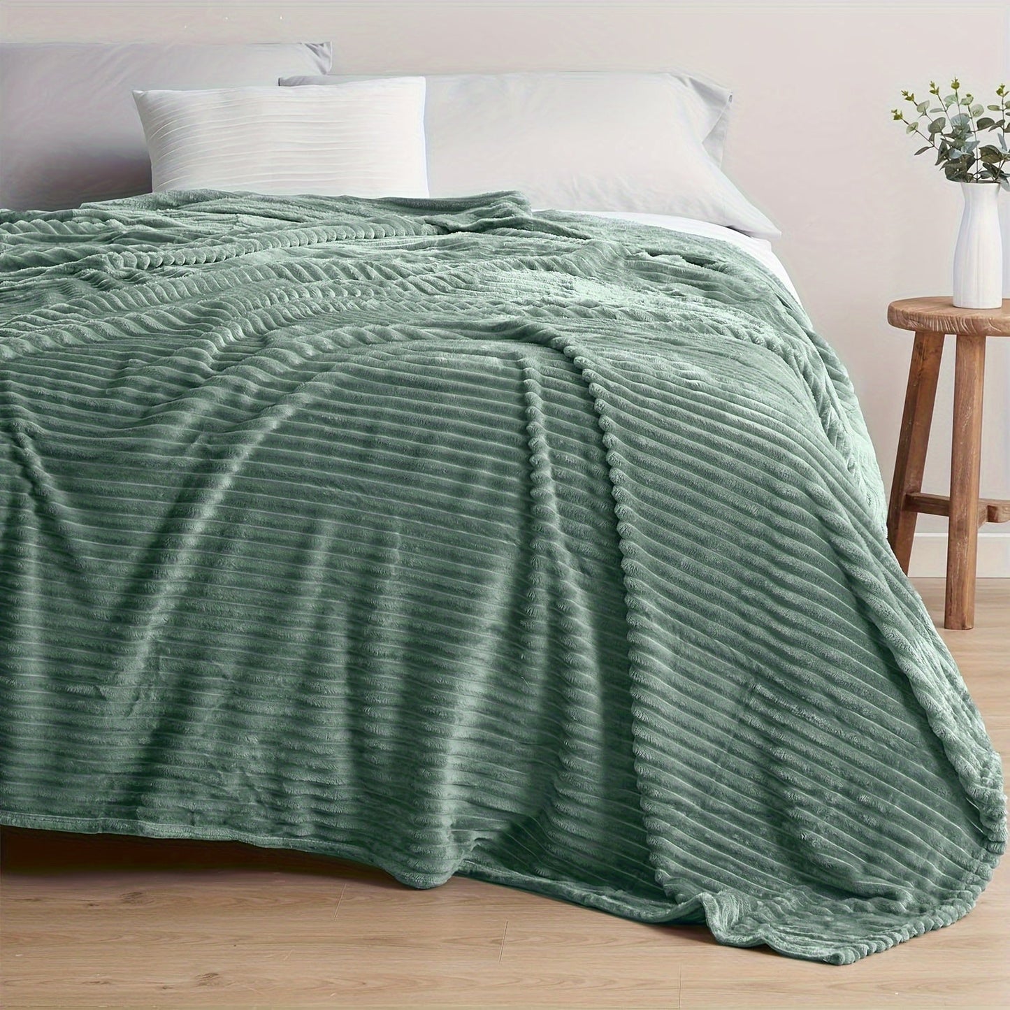 Stay cozy and warm with our Ultra-Soft Oversized Fleece Throw Blanket. Made with lightweight and warm 280GSM microfiber, this blanket features a 3D ribbed Jacquard design for added style. Hypoallergenic and perfect for all seasons, this blanket is a