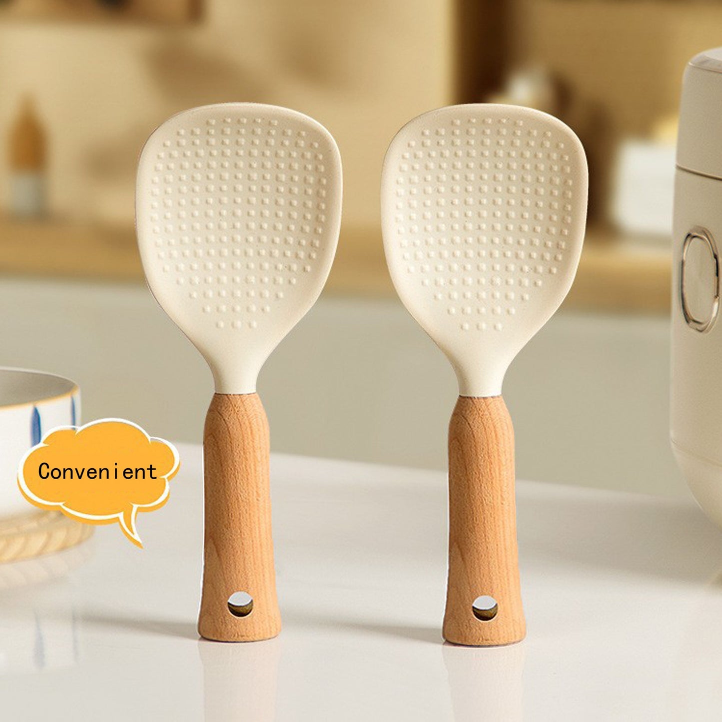 Silicone rice spoon with wooden handle, ideal for non-stick cookware, durable and convenient serving utensil.