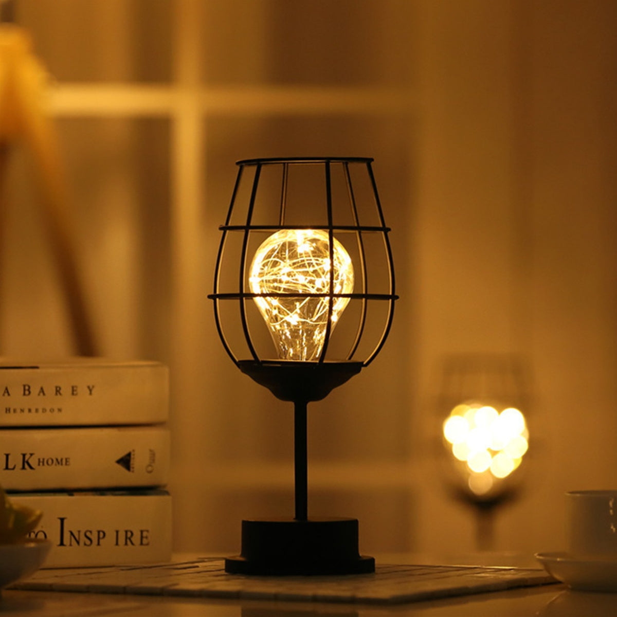 Modern accent light, krlviil Iron Wire Cage Design Night Light is a 0.5W Battery-Powered LED Lamp that provides decorative table lighting for the bedroom or living room. This light fits three AA batteries (batteries not included).