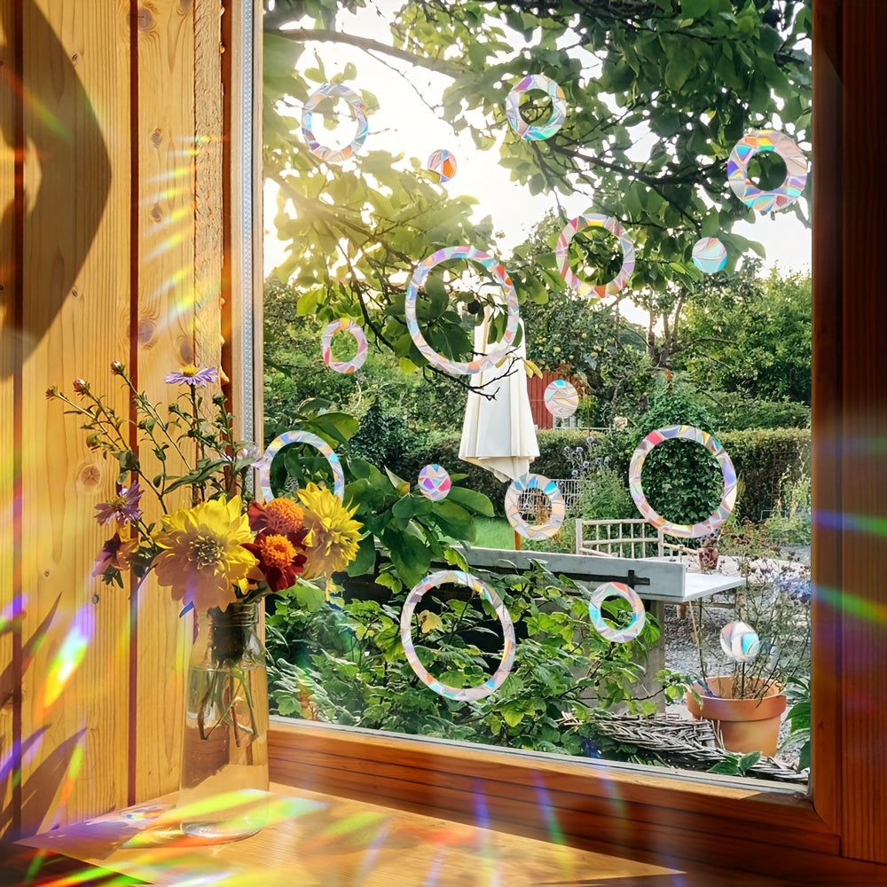 Add a touch of color to your windows with our set of 13 Rainbow Star & Circle Window Clings. These reusable, non-adhesive prism decals are perfect for glass doors and windows, providing a bird-safe anti-collision film. Elevate your contemporary home