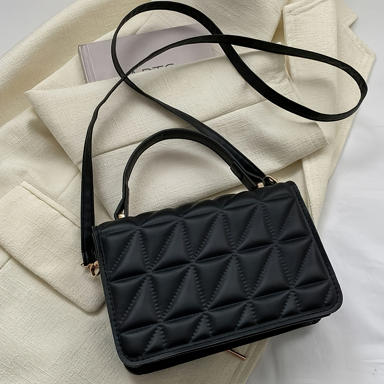 Stylish quilted crossbody bag with removable strap, magnetic closure, water-resistant lining, and top handle satchel for women.