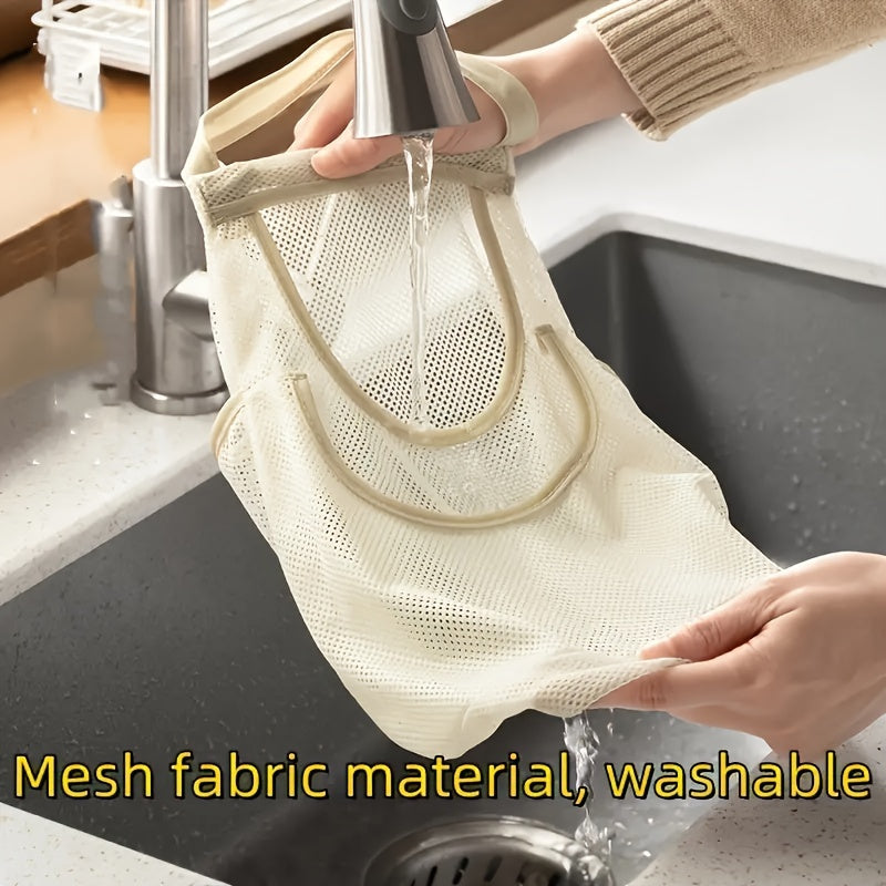 Organize your kitchen or bathroom with this durable polyester wall-mounted mesh storage bag. Featuring a drawstring closure, perfect for storing onions, garlic, fruits, and vegetables in a convenient and space-saving manner.