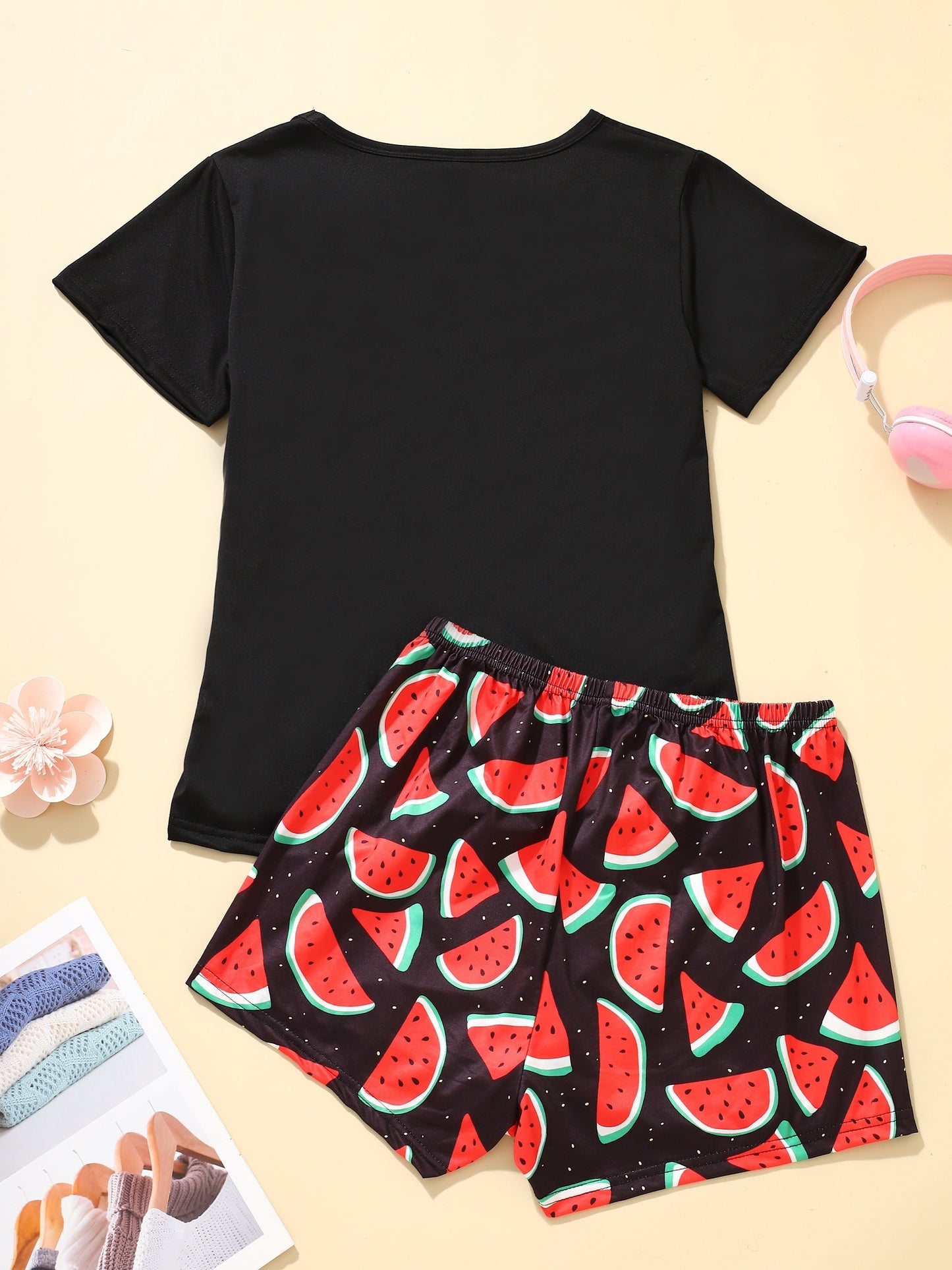 Women's loungewear set with watermelon and letter print, including short sleeve top and elastic shorts.