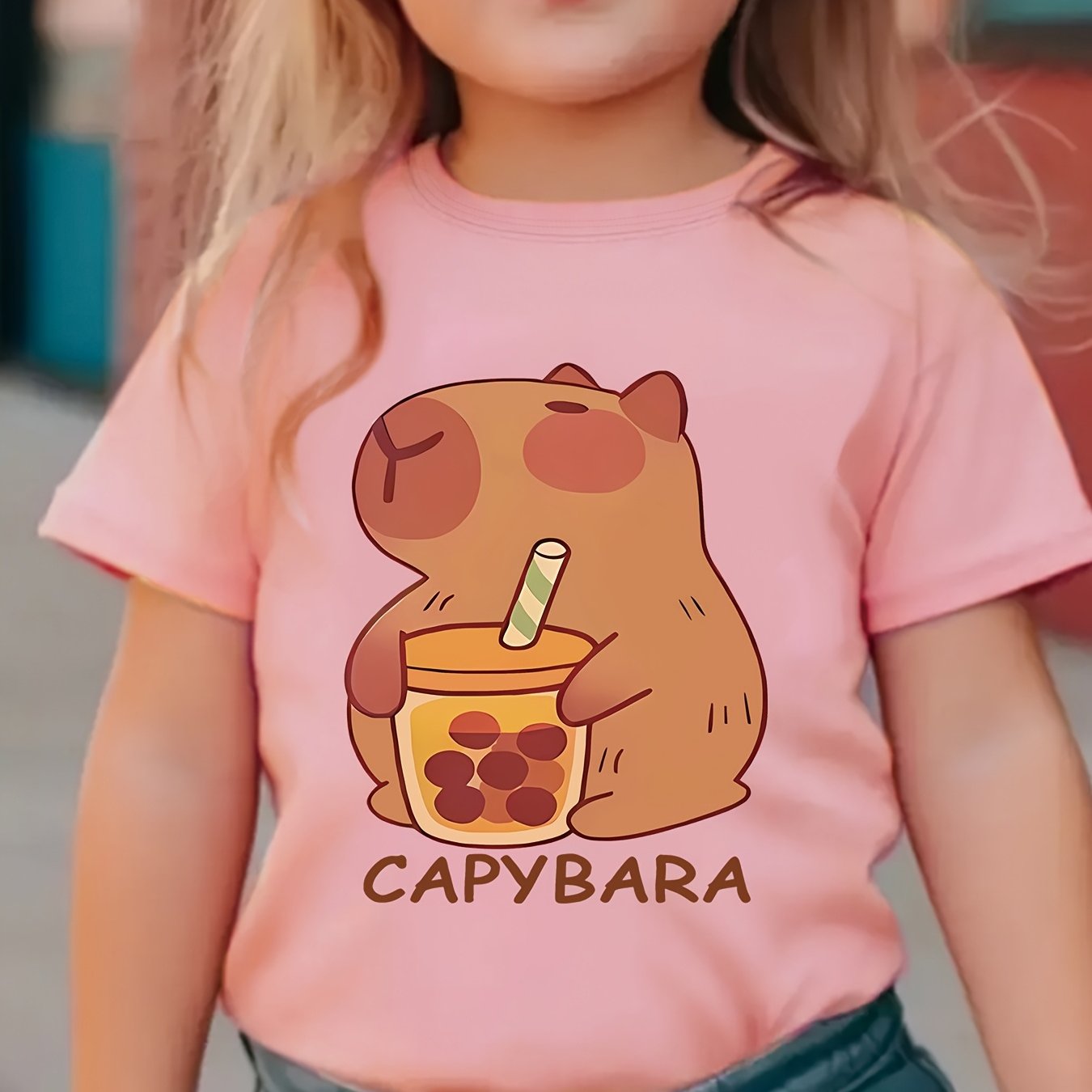 Girls' cozy round neck t-shirt with capybara drinking milk tea pattern, perfect for spring and summer.