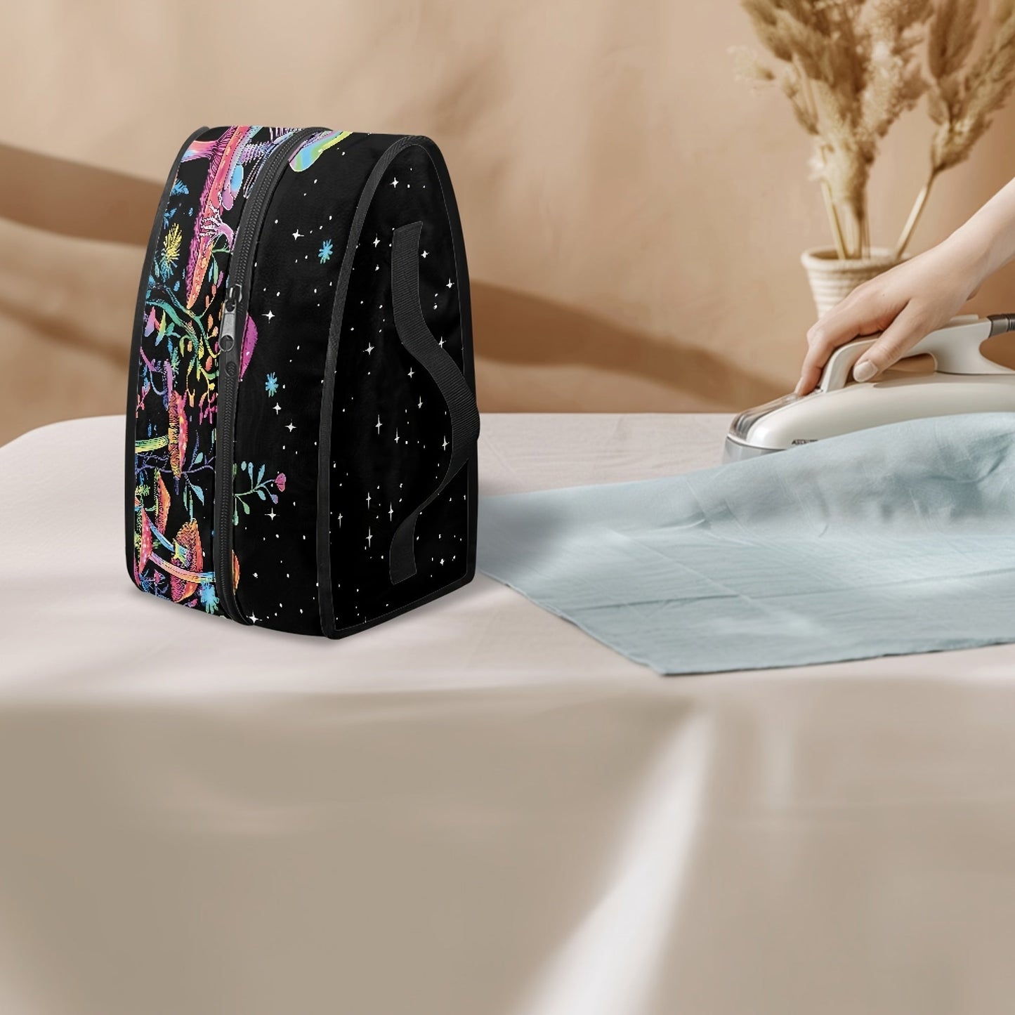 Travel in style with this Portable Ironing Bag featuring a unique Mushroom Skull print. This bag is equipped with a dual zipper and top handle for easy carrying. Made of dust-proof polyester, it is ideal for storing or transporting your clothes