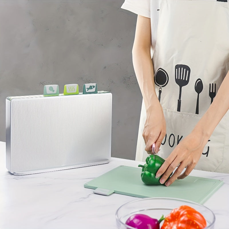 A set of four square cutting boards with a non-slip base, made of thickened plastic and accompanied by a storage rack. These cutting boards are designed for easy fruit and vegetable preparation, with a spill-proof classification system. Perfect for