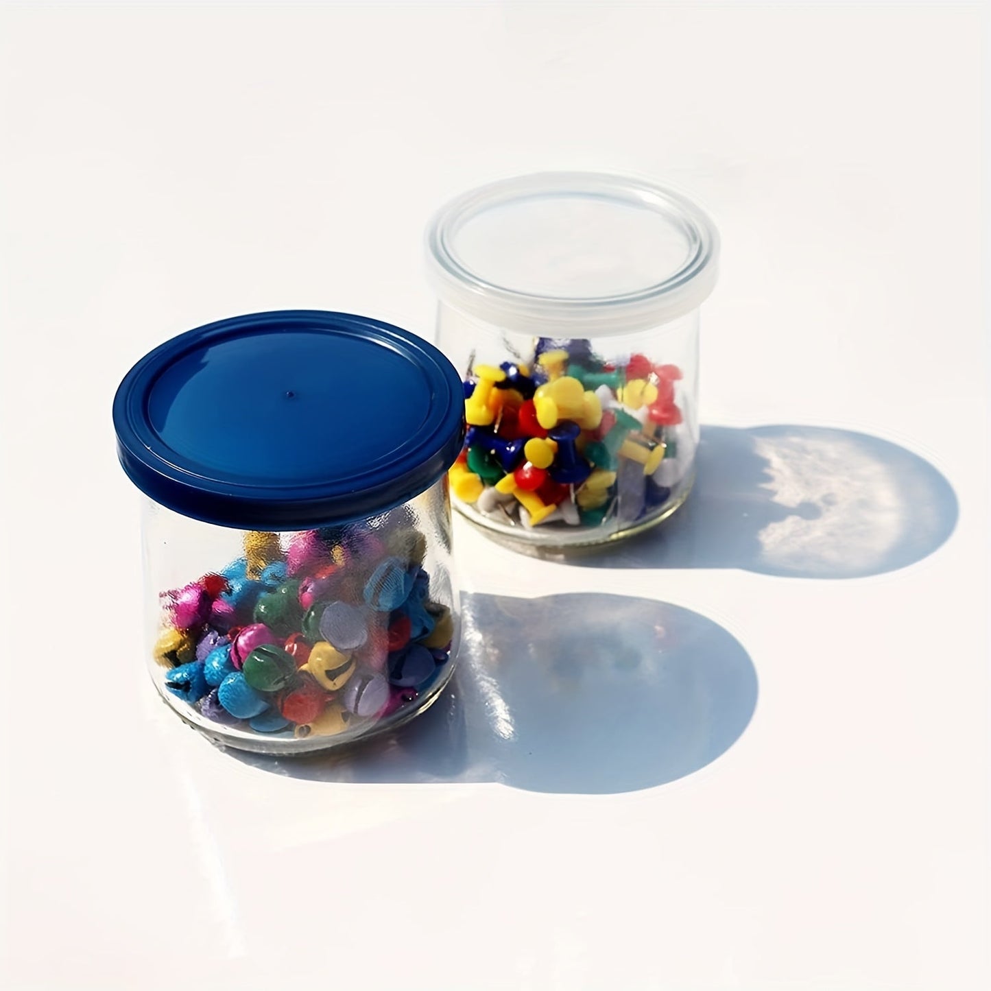 30 to 60 pieces of Oui Yogurt Jar Lids. These clear plastic blue lids are perfect for cookie and coffee supplies, as well as storing glass jars in the kitchen. Perfect for kitchen storage needs.