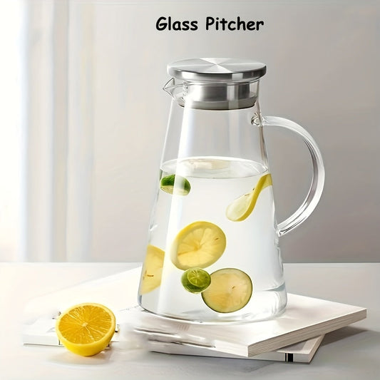 Heat resistant glass pitcher with lid, perfect for hot/cold drinks. Featuring a 1.8L clear beverage carafe with handle for easy serving. Ideal for home, restaurant, or office use. Easy to clean and makes a great gift for Christmas or New Year. A