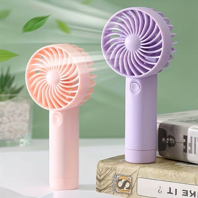 Ideal for both indoor and outdoor use, this portable handheld fan features a 3-speed setting and a 400mAh USB rechargeable battery. With a wearable electric design and button control, this mini fan is made of durable plastic material. It makes the