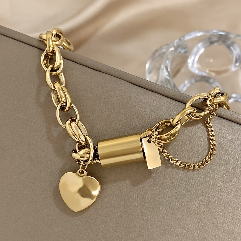 Fashionable heart pendant wrist jewelry made of thick gold-colored stainless steel chain with a punk and chunky design.