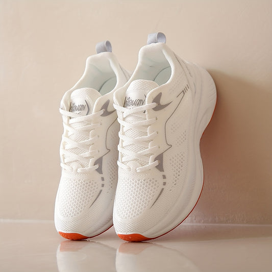 Women's low-top running shoes in white with orange sole, breathable fabric upper, rubber sole, stabilizing support, all-season casual sneakers.