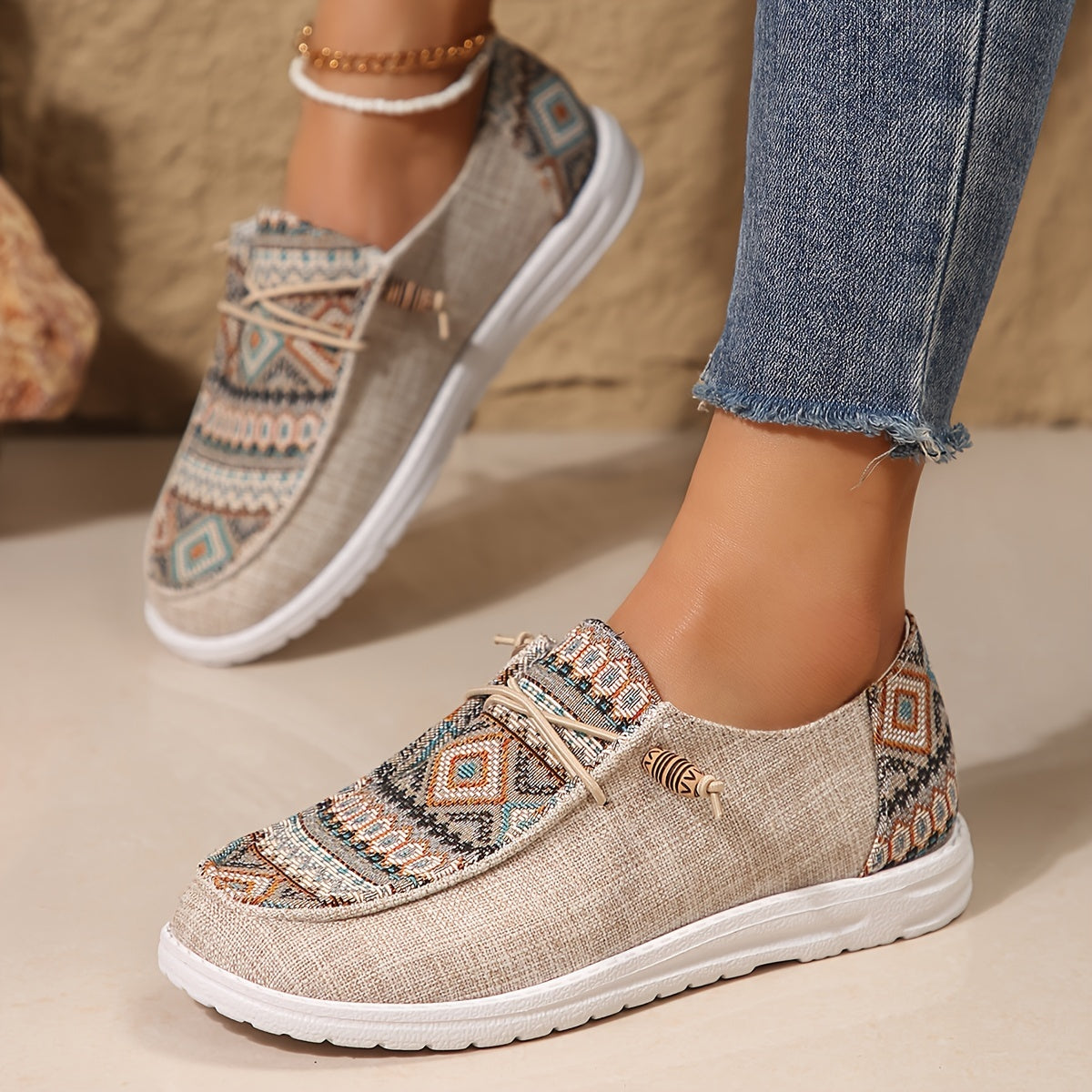 Casual lace-up canvas sneakers with ethnic print for women.