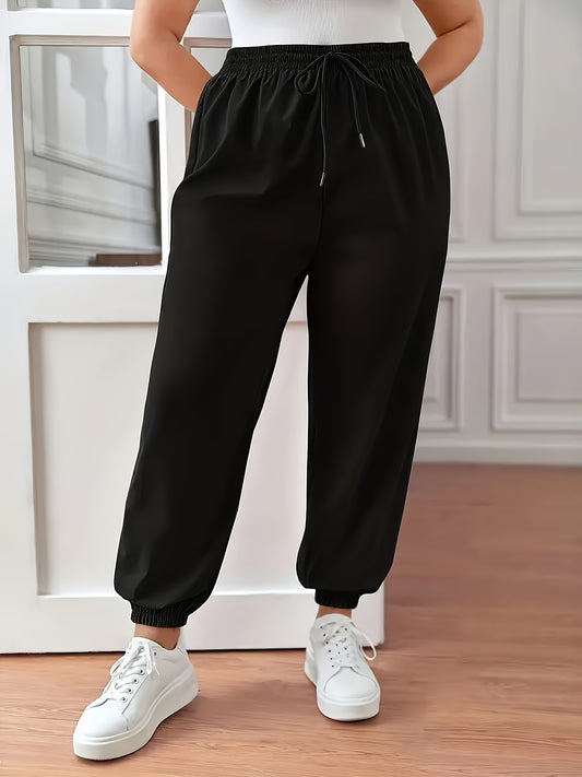 Plus Size Solid Fitted Joggers with Drawstring Waist for Spring/Summer Casualwear by Women's Plus Size Clothing.