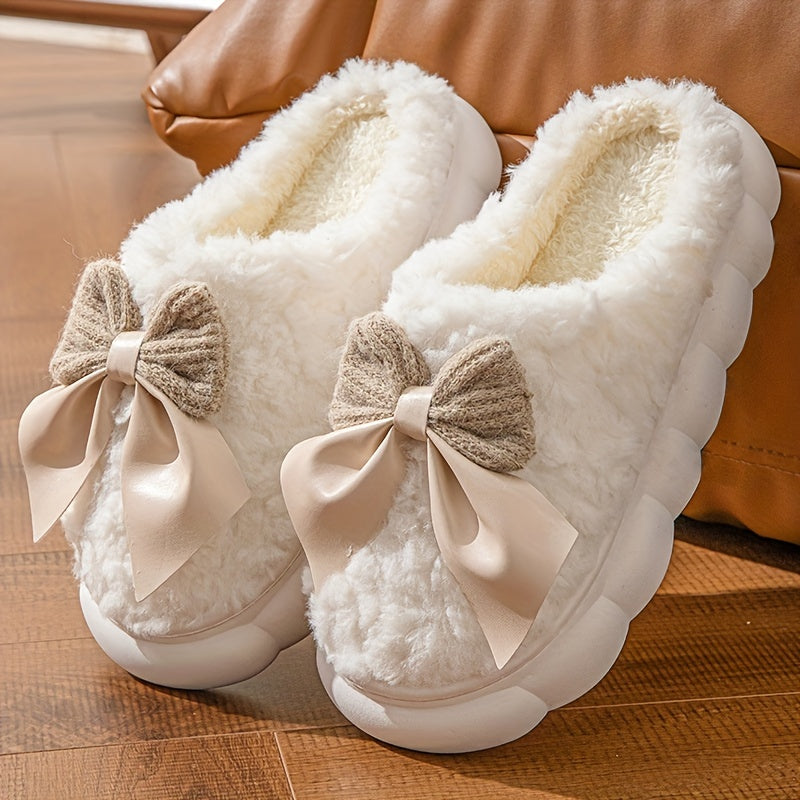 Women's winter warm plush slippers with bowknot detail and non-slip sole, perfect for autumn/winter indoor wear.