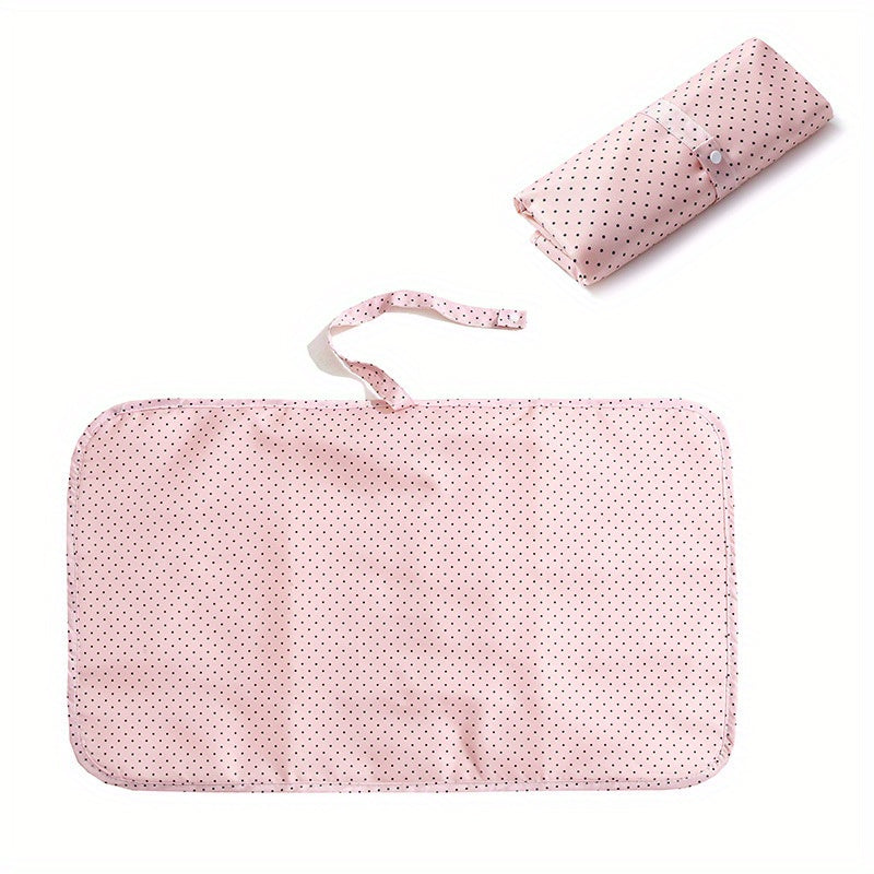 Lightweight and waterproof, this foldable diaper changing pad is perfect for traveling with your little one. Stay prepared for on-the-go diaper changes with this portable and compact changing mat.