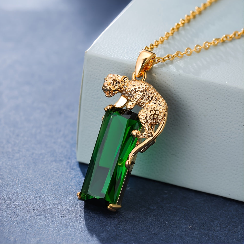 Golden plated green artificial crystal leopard pendant necklace, perfect for women who love hip hop punk style. This created emerald panther necklace makes a unique and stylish jewelry gift.