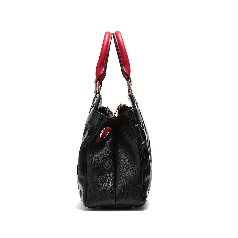 Luxury leather tote bag with embossed letters for women.