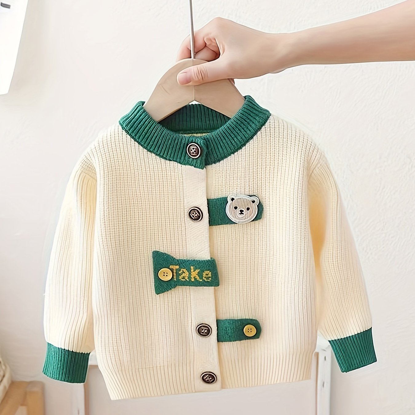 Cute boys' mustard yellow cardigan with bear patch. Cozy knit outerwear, perfect for fall/winter.