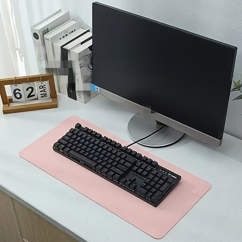 Black non-slip desk mat for office, ideal for computer and mouse.