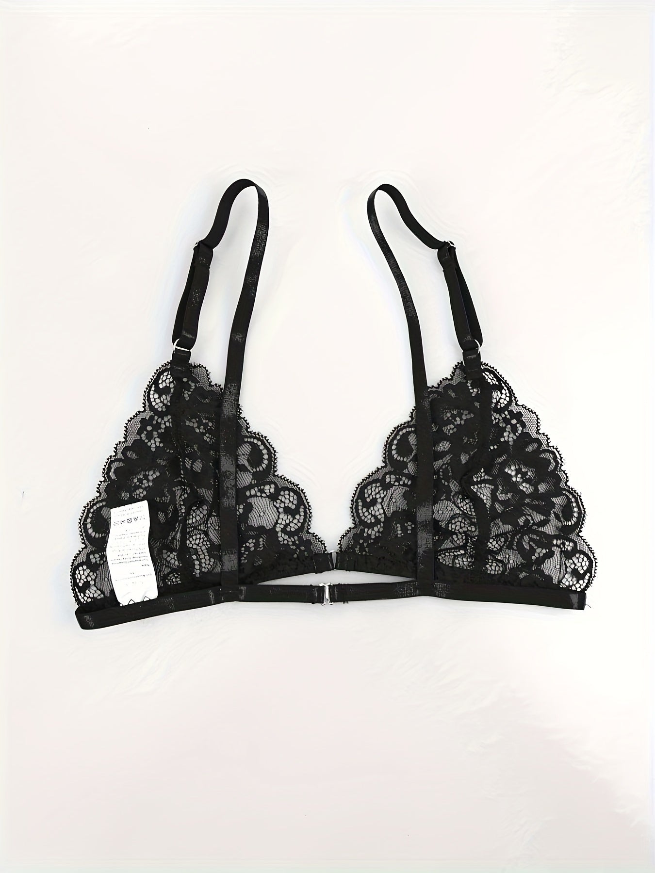 4-piece set of sexy lingerie with lace triangle cup bra, panties, suspender socks, and seduction ring in European and American styles.