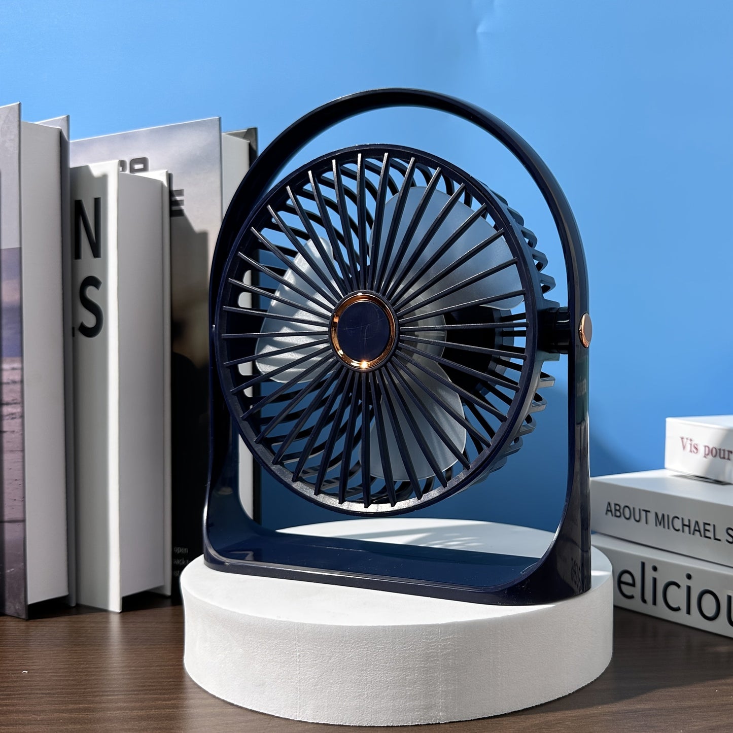 Introducing the Jkuoo Ultra-Quiet USB-C Desk Fan, a compact and portable cooling solution with powerful airflow and 5-speed adjustment. With a 360° tilt feature and ambient night light, this fan is perfect for both office and home use. Enjoy silent