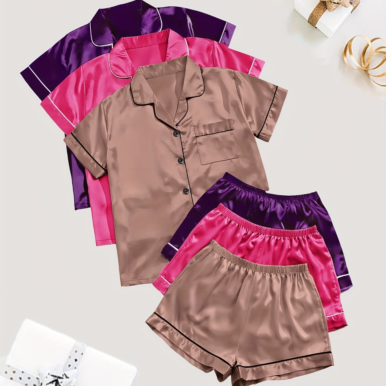 Solid satin pajamas with short sleeve button top and elastic shorts for women's sleepwear.