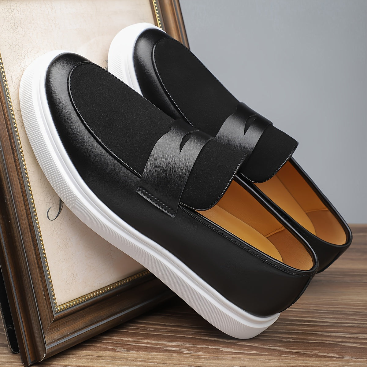 Men's preppy slip-on sneakers with low top design in solid color, featuring PU upper and inner, rubber sole, and round toe for daily wear.