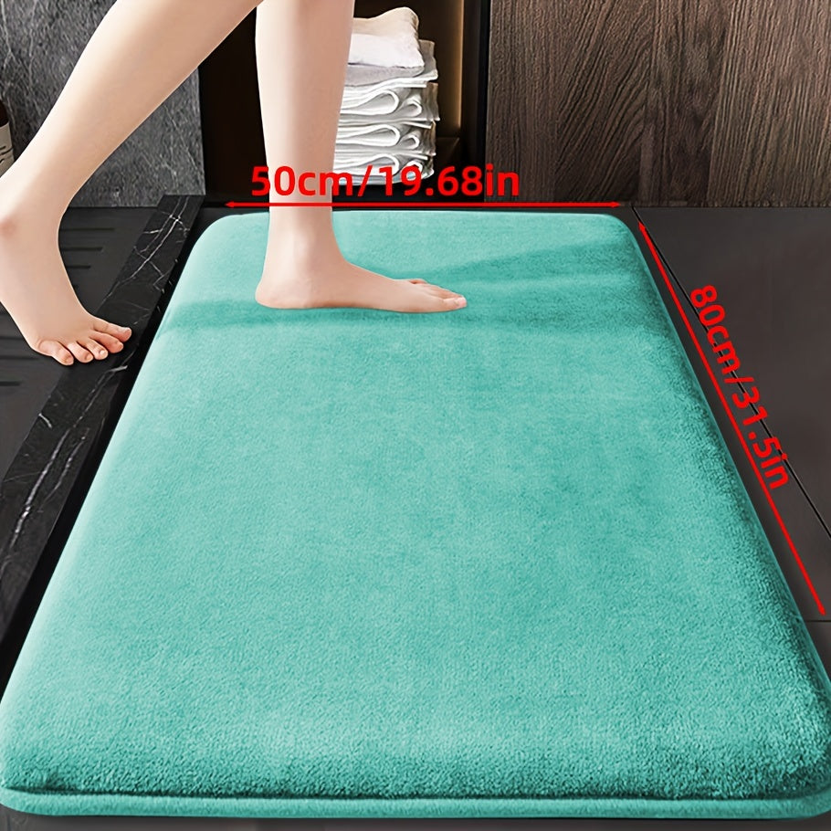 Soft and durable polyester bathroom mat with geometric design, ideal for shower, bathtub, bedroom, and living room. Versatile and non-slip, it is highly absorbent and machine washable.