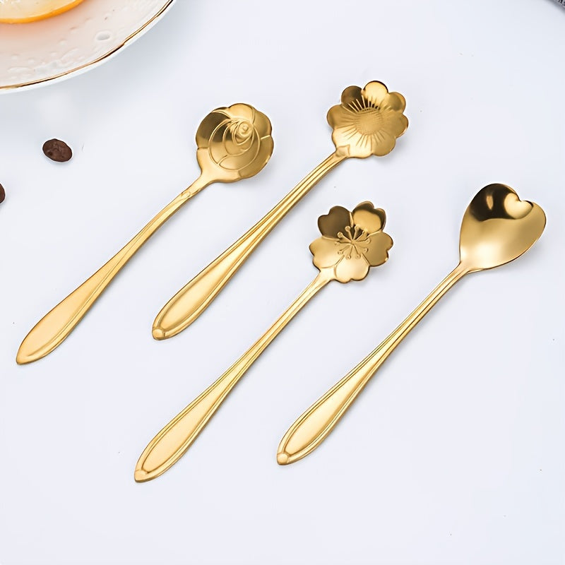 Four stainless steel cherry blossom coffee/dessert spoons.