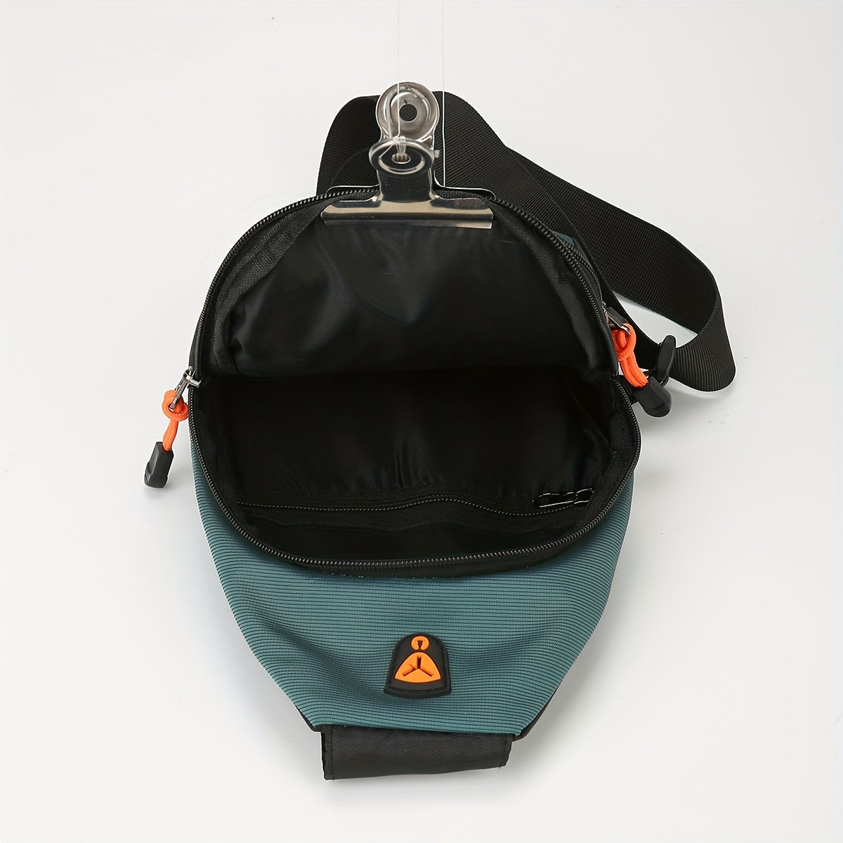 Durable, lightweight chest bag for outdoor activities with ample space.