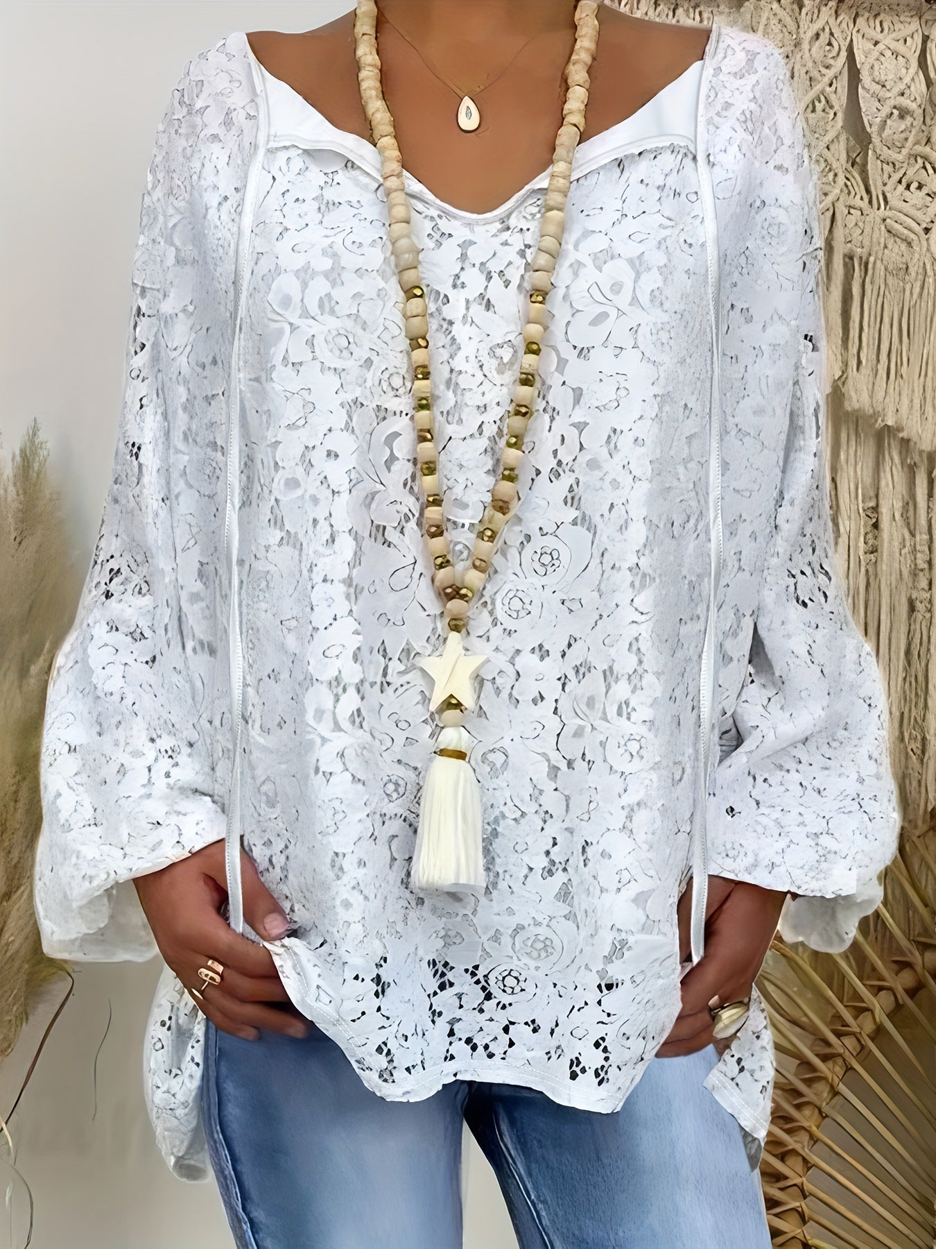 Elegant plus size white lace V-neck top with long sleeves, loose fit knit for autumn.