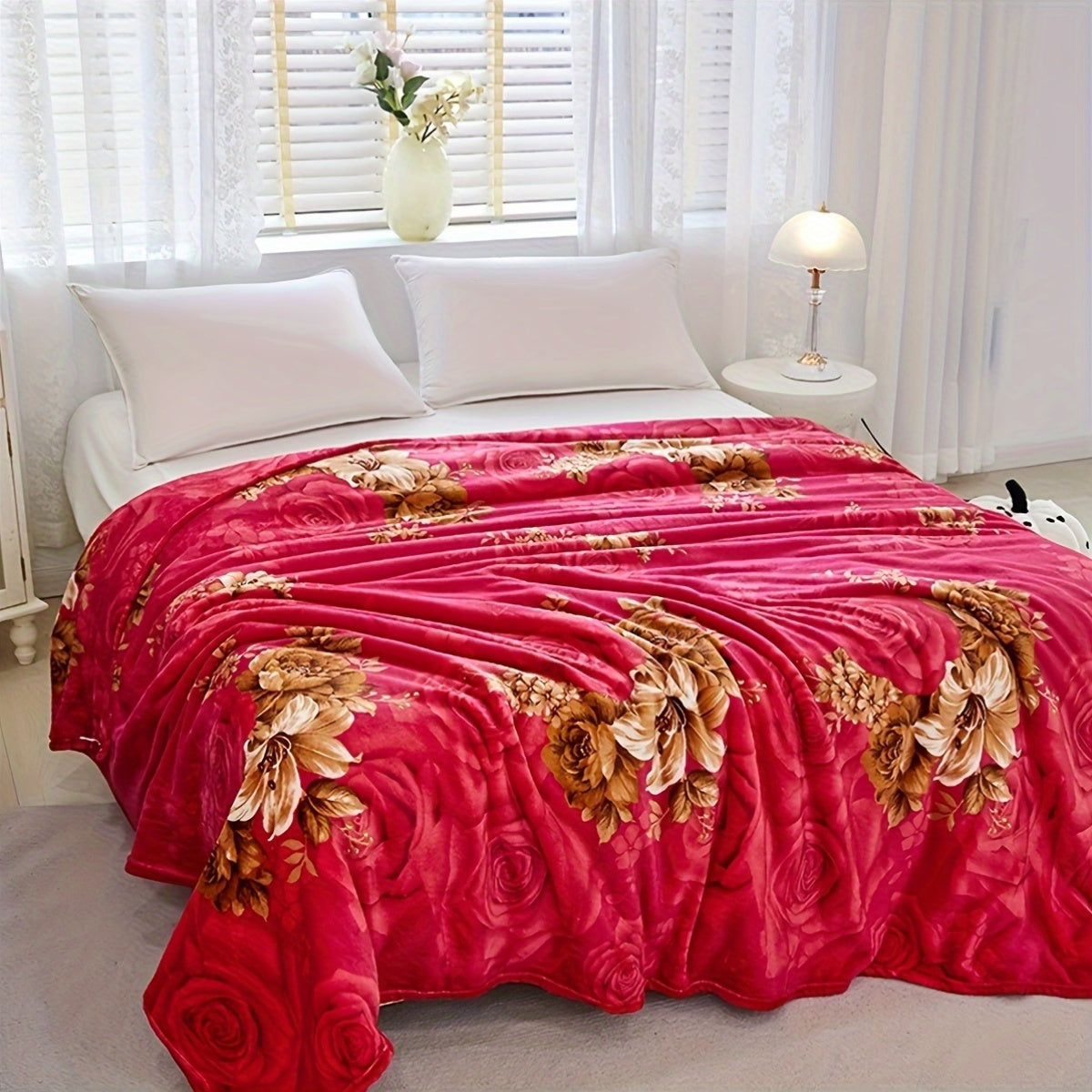 Soft warm knitted floral blanket in contemporary style with vibrant flower design. This all-season multipurpose polyester bed blanket is machine washable, featuring an embellished flower pattern.