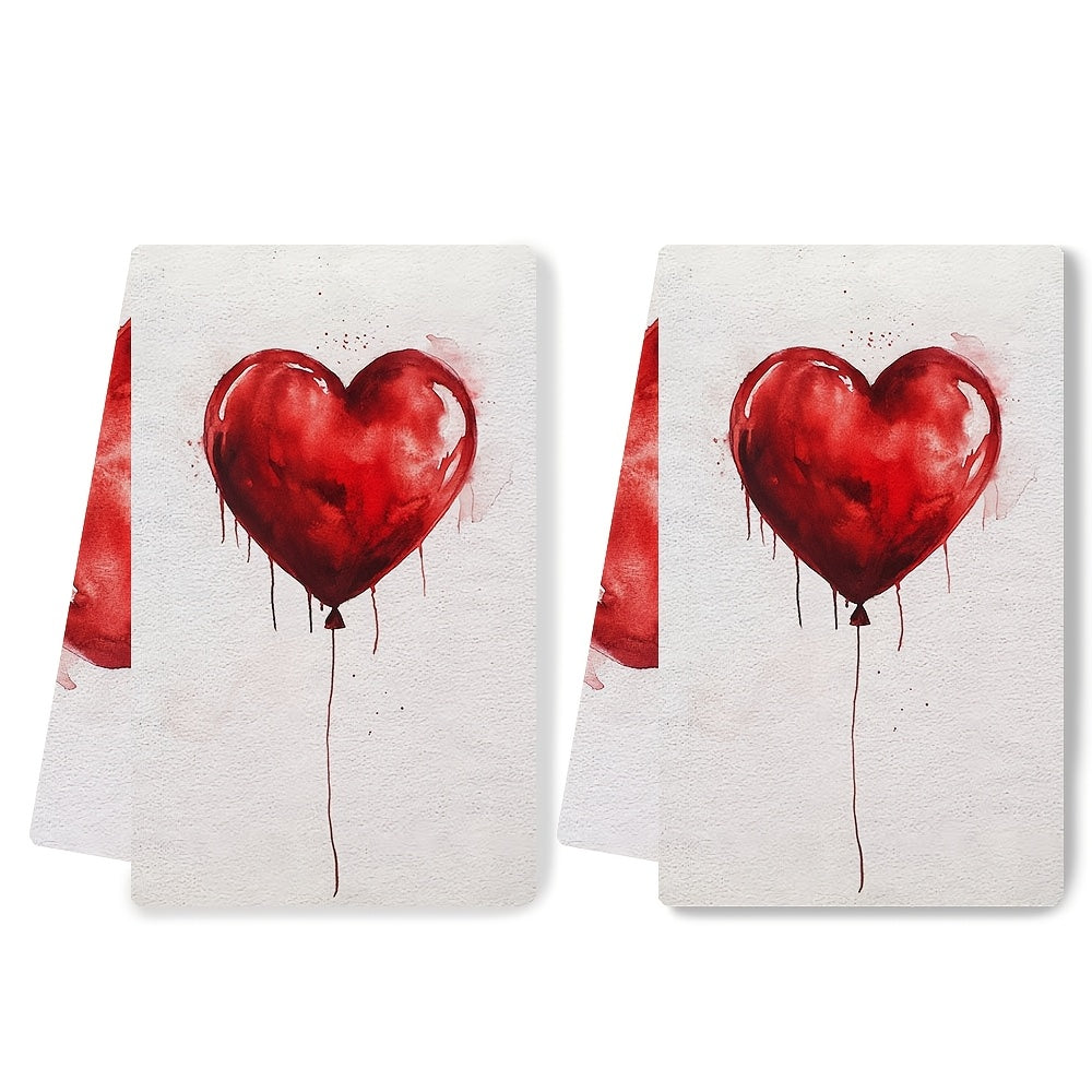 Two pieces of ultra soft kitchen towels featuring a Valentine's Day heart balloon design. These towels are highly absorbent and machine washable, making them perfect for dish and hand drying. With a contemporary style and measuring 40.64x60.96 cm, these