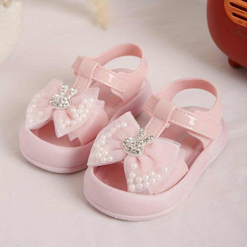 New 2024 baby girl sandals with anti-kick feature, cute rabbit design, and soft soles for beach.