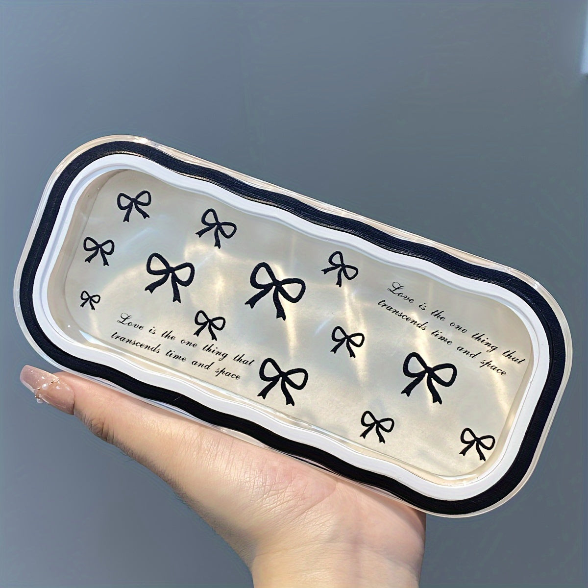 Protect your eyeglasses in style with the Bow Pattern Protective Eyeglass Case. This durable plastic case is designed for lightweight portability and features anti-pressure technology. Ideal for storing myopia eyewear and glasses, this case is part of