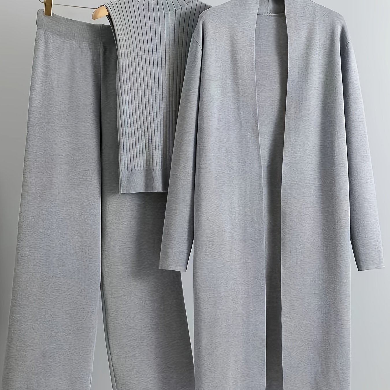 2024 women's three-piece knit set with wide-leg pants, cardigan, and turtleneck sweater.