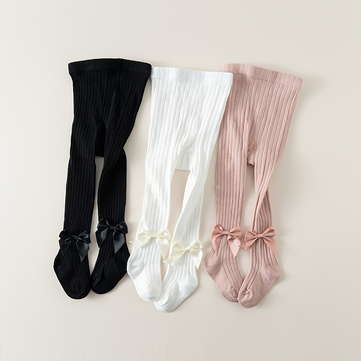 3-pack soft cotton blend bowknot pantyhose for youngsters featuring warm, breathable, and cute striped tights.