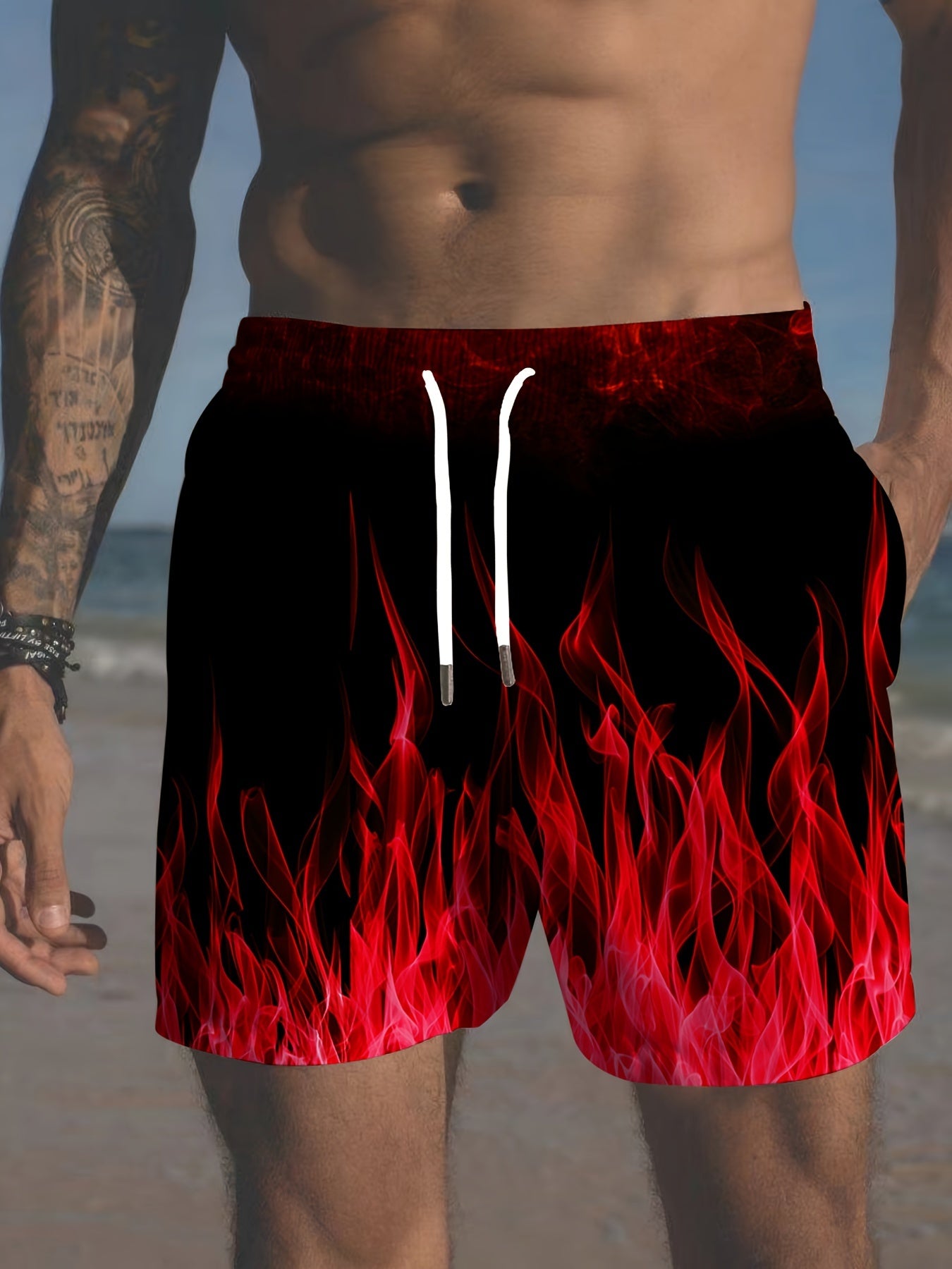 Men's plus size gradient flame print beach shorts with drawstring waistband, perfect for summer.