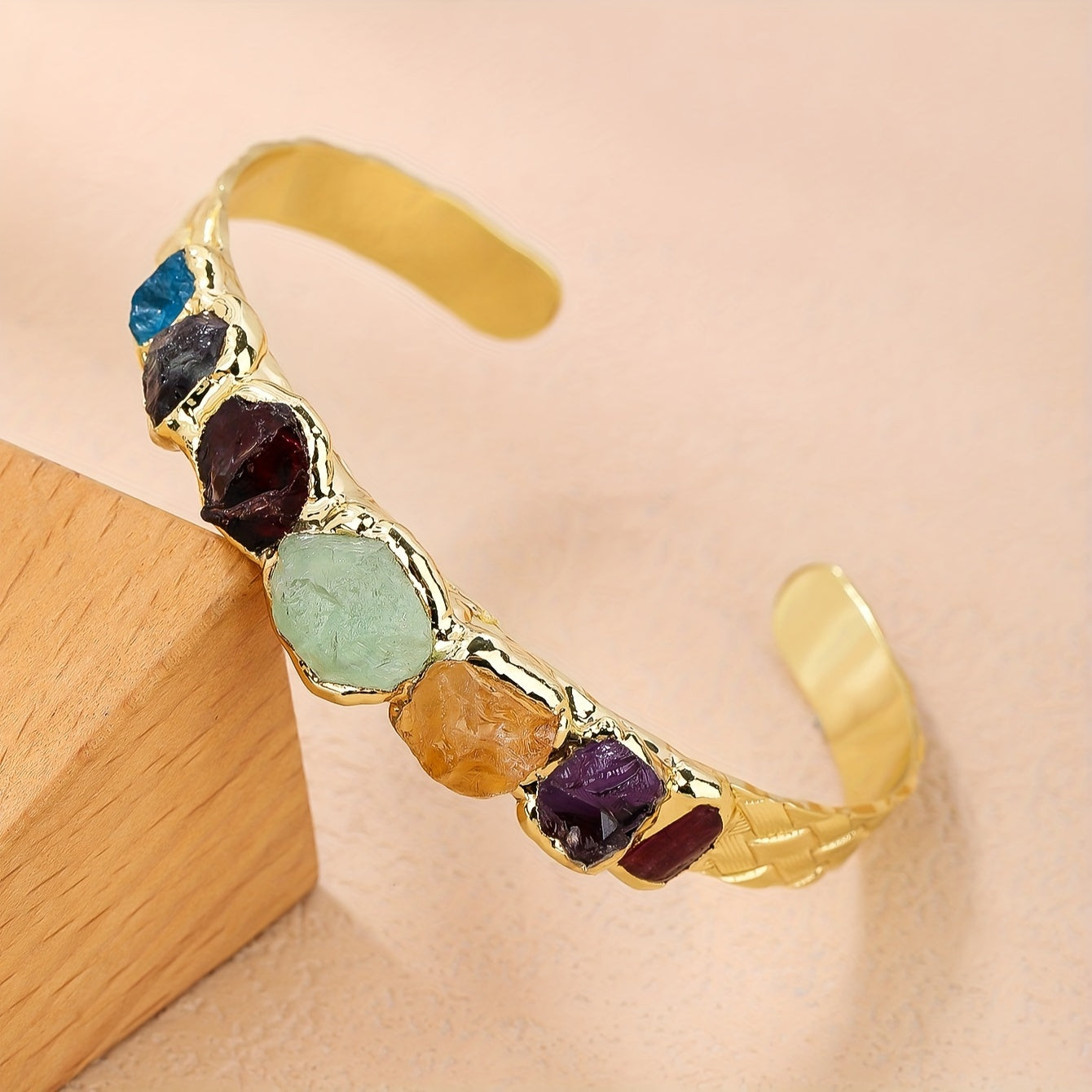 Handmade Bohemian Copper Cuff Bracelet adorned with 7 gemstones, featuring a unique burnt welded design. This beautiful piece showcases a vibrant mosaic of natural rock crystals, making it a perfect accessory for summer parties and Mardi Gras