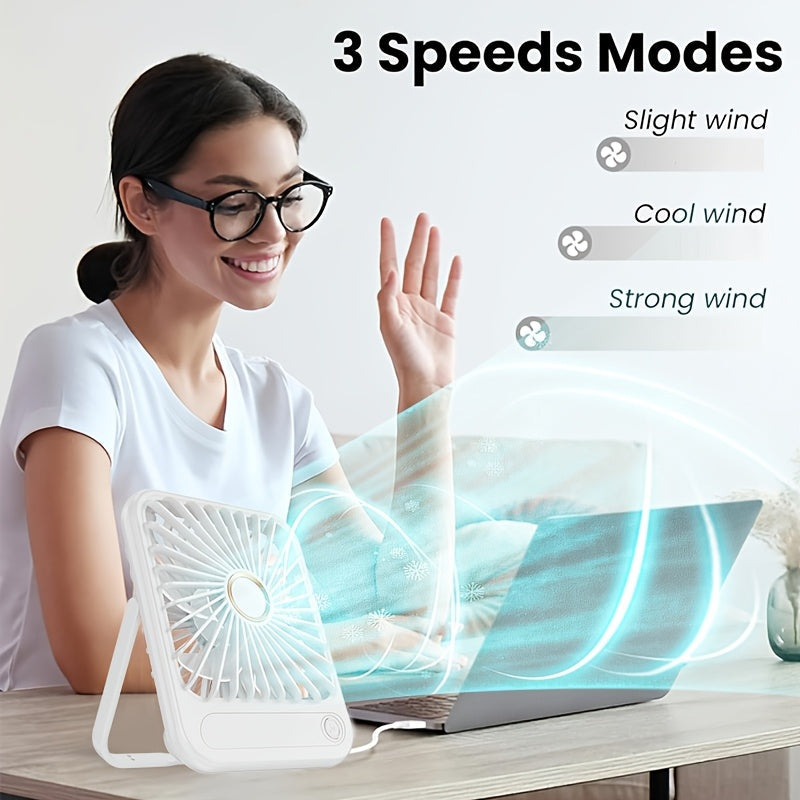 Compact USB rechargeable table fan with 3 speed modes and button control. Made of plastic, suitable for indoor and outdoor use. Rated at 5W, includes cord and built-in lithium battery for convenient office, bedroom, and camping use.