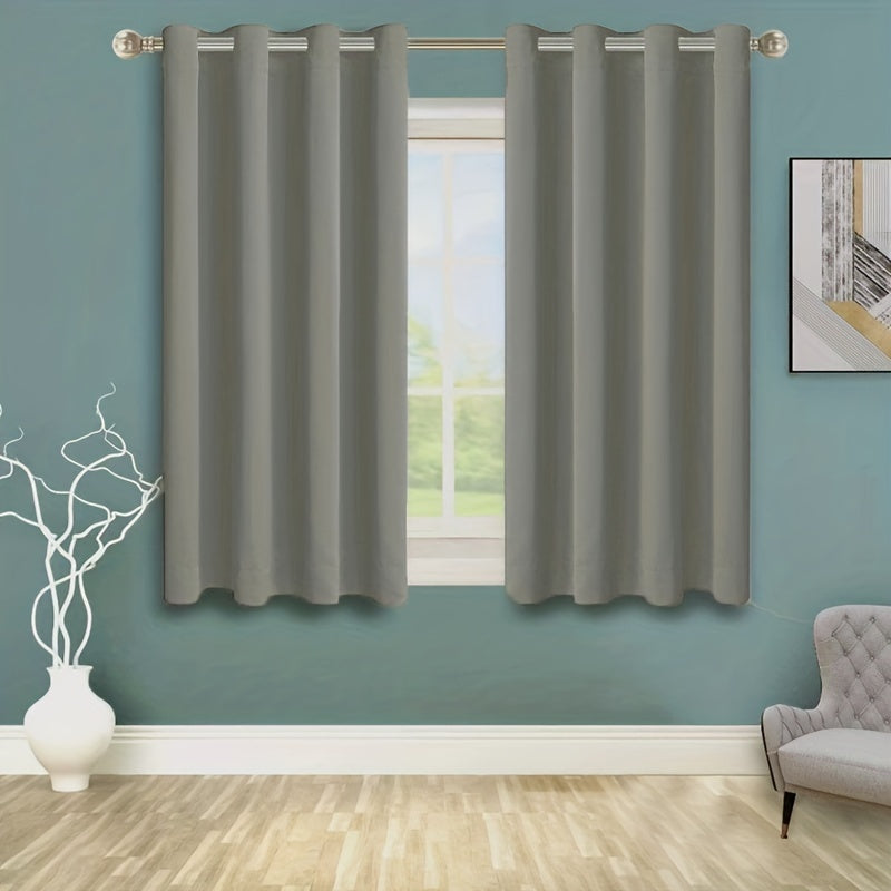 Enhance your space with this 1-panel blackout curtain in solid black color, designed to insulate against heat and cold, darken the room, and reduce incoming light. Perfect for adding style and functionality to your study, bedroom, kitchen, or living room