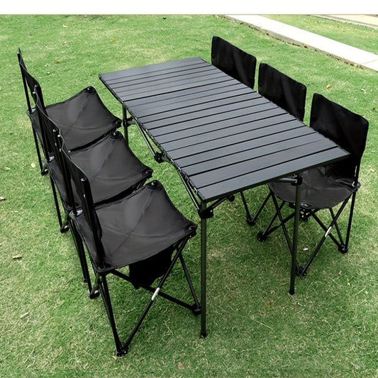 Compact and easy-to-carry portable stainless steel folding table for camping, barbecuing, and outdoor picnics.