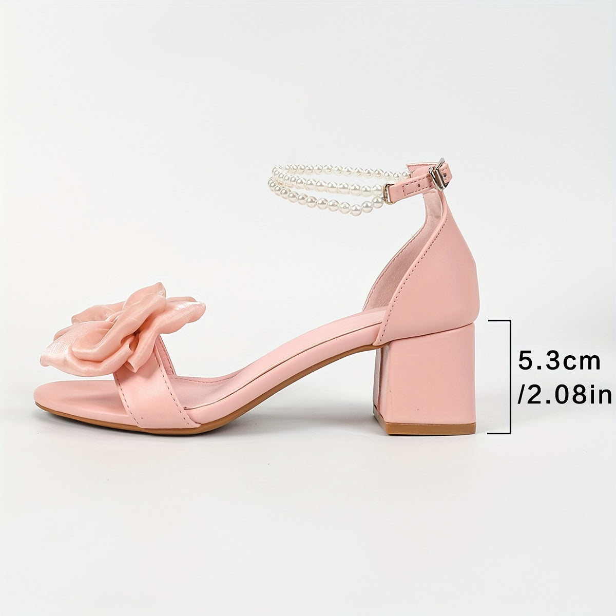 Chunky low heeled sandals with bow decor and faux pearl ankle strap, perfect for evening wear.