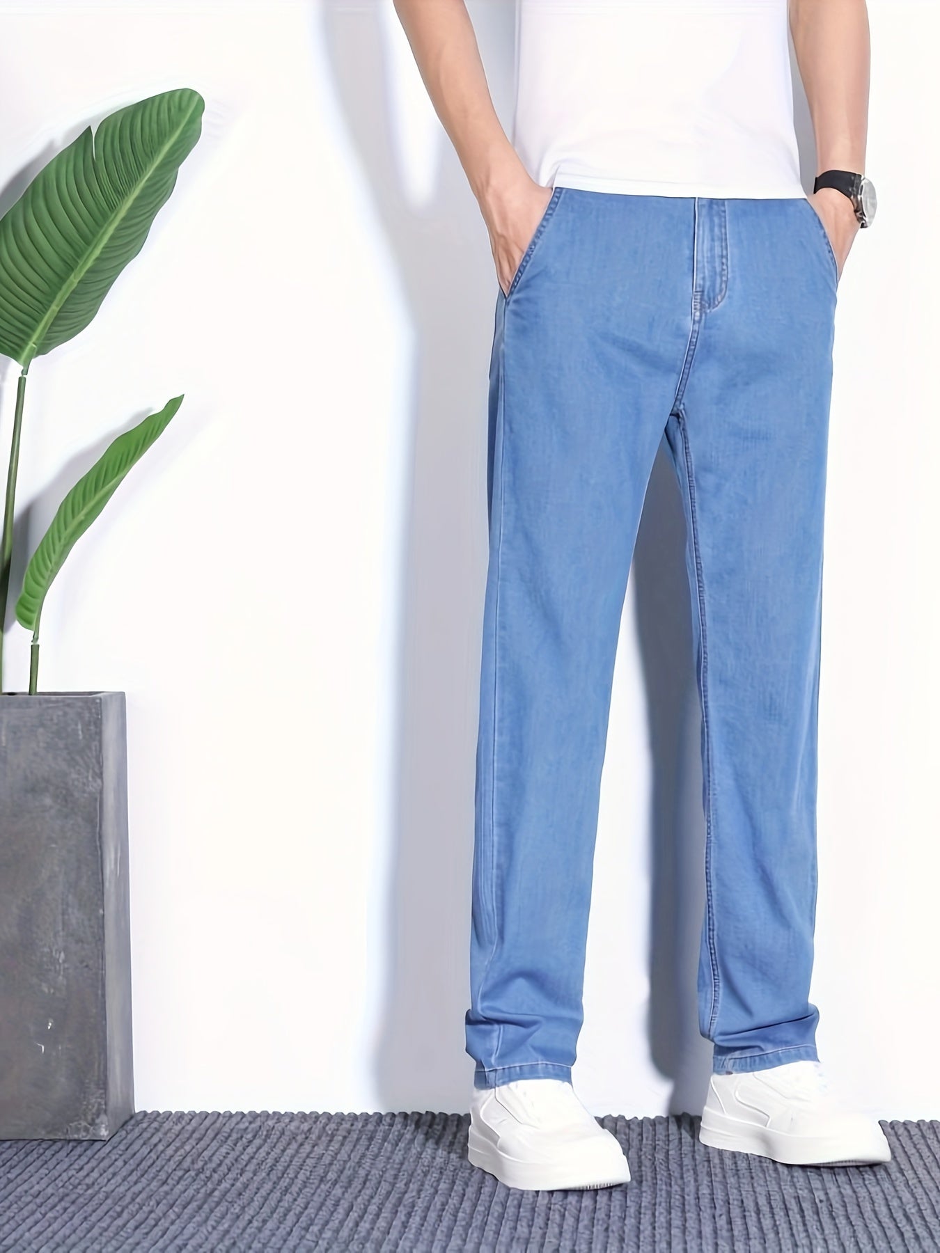 Summer jeans for men, regular fit with breathable lightweight denim and pockets.