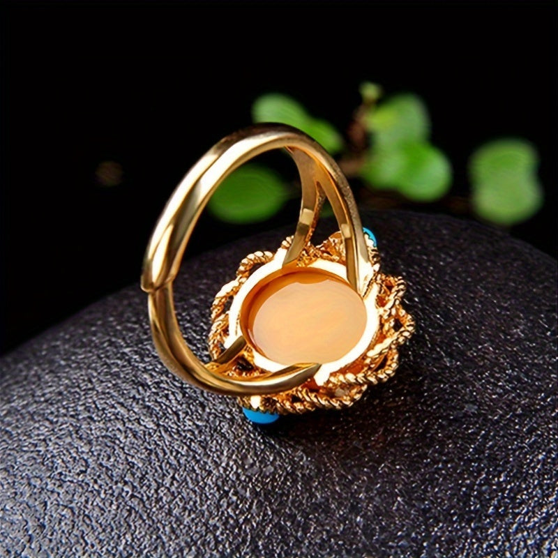 Vintage vacation style Claddagh ring featuring synthetic amber and turquoise stones, crafted with 18K golden plated 925 silver. The ring has an adjustable opening and is perfect for both daily wear and special occasions. This handcrafted personalized