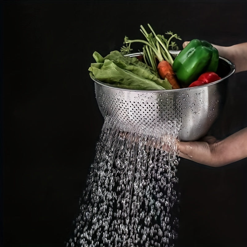 A durable stainless steel colander with fine mesh for straining, featuring a slant bottom draining bowl perfect for washing rice, vegetables, fruits, beans, and pasta. This kitchen colander is designed for quick draining with food-safe materials.