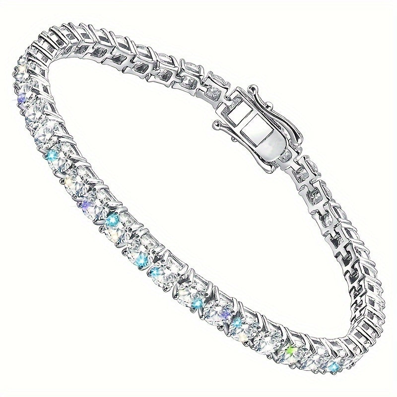 This stunning Mozambique Stone Tennis Bracelet, crafted with 18k Gold-plated 925 Sterling Silver, is designed for both women and men. It features a dazzling 5mm D Color VVS1 Round-cut laboratory-made diamond, certified by GRA, creating an exquisite